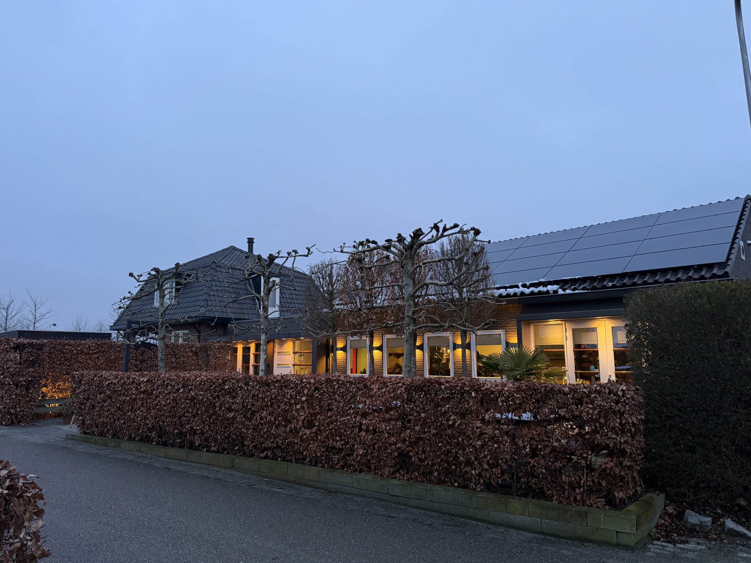 Cozy house with illuminated windows